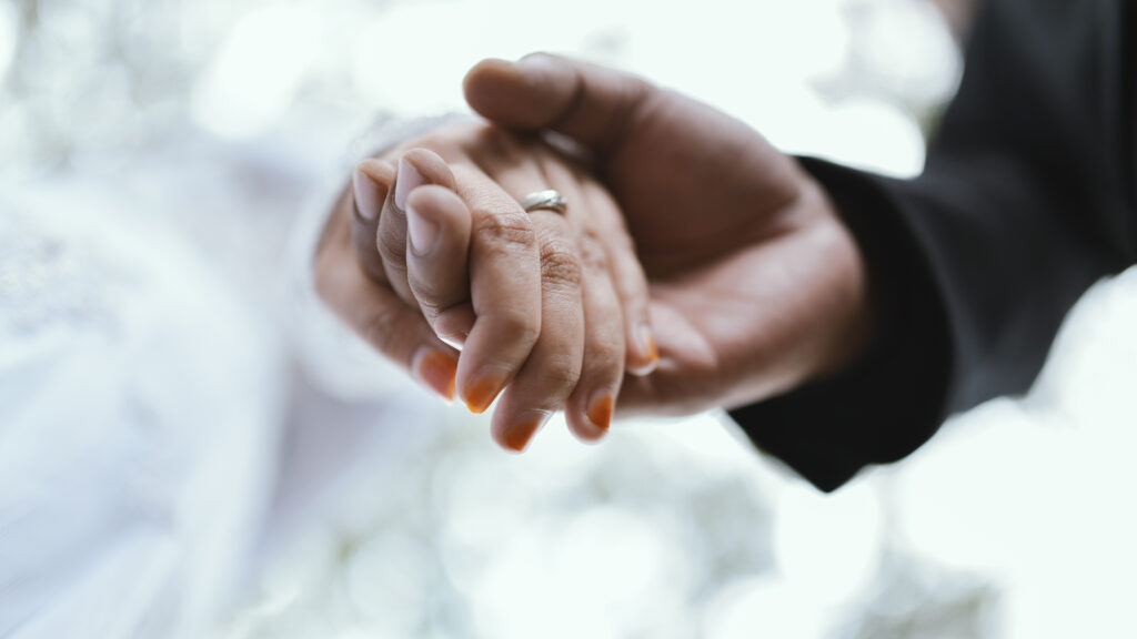 married-couple-holding-hand-2021-08-29-21-26-38-utc
