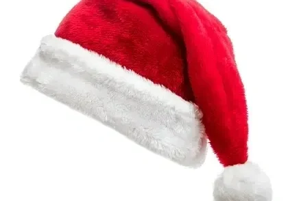 A red and white santa hat is on the ground